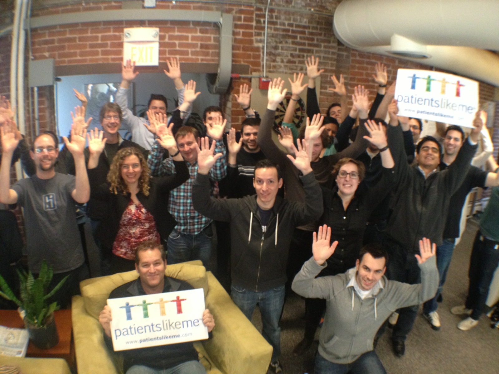 PatientsLikeMe Employees Raising Their Hands for Rare Disease Day 2013