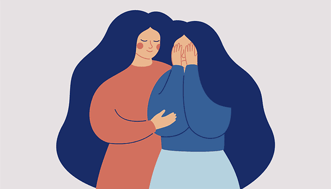 woman holding another woman